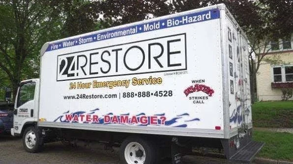 Former 24 Restore truck branding