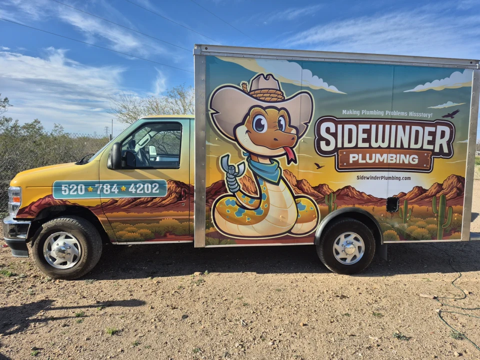 Sidewinder Plumbing truck with the new mascot and desert wrap